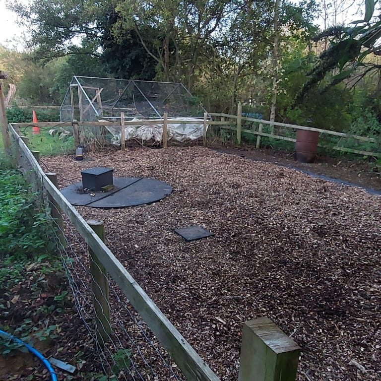 landscaping spreading wood chip bark